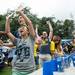 Michigan Wolverines fans cheer after playing a game of flip cup as they tailgate before Michigan's game against Central Michigan, Saturday, August 31. Courtney Sacco | AnnArbor.com